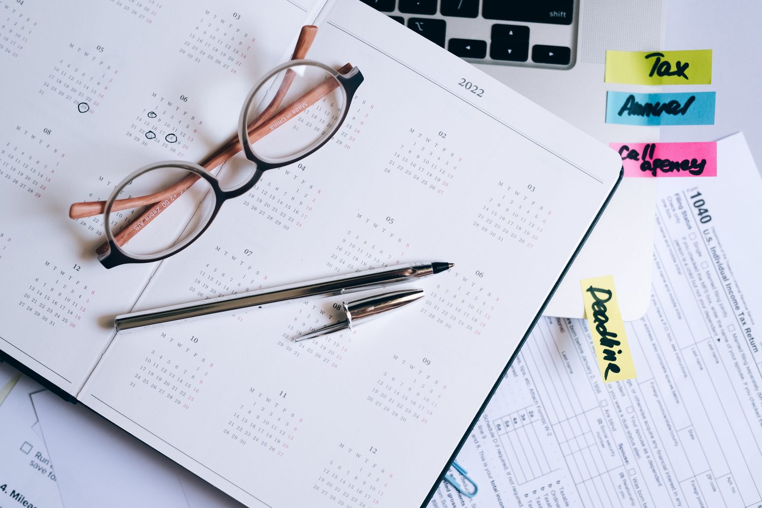Eyeglasses on a planning desk